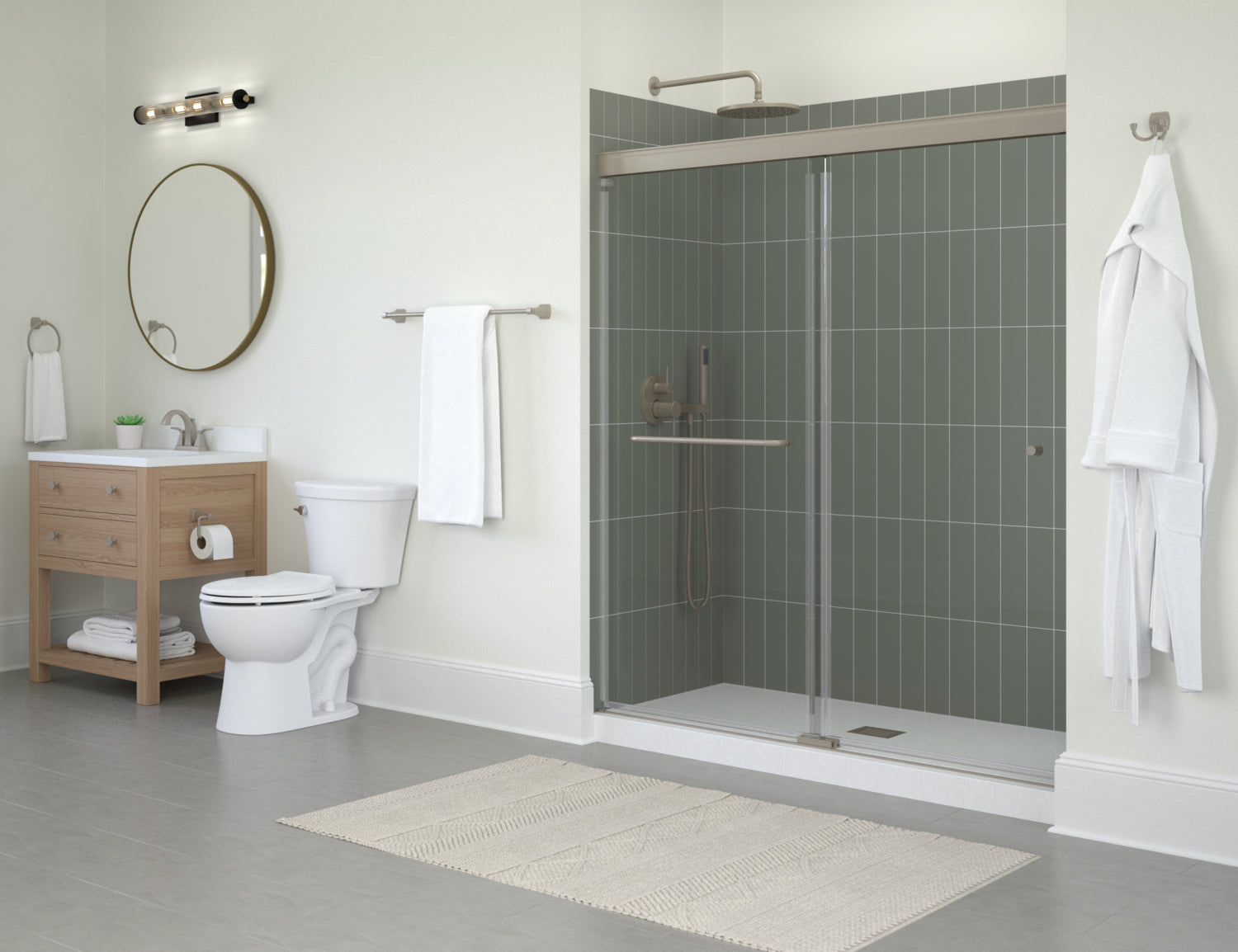 Modern bathroom with toilet, sink, and shower enclosure.