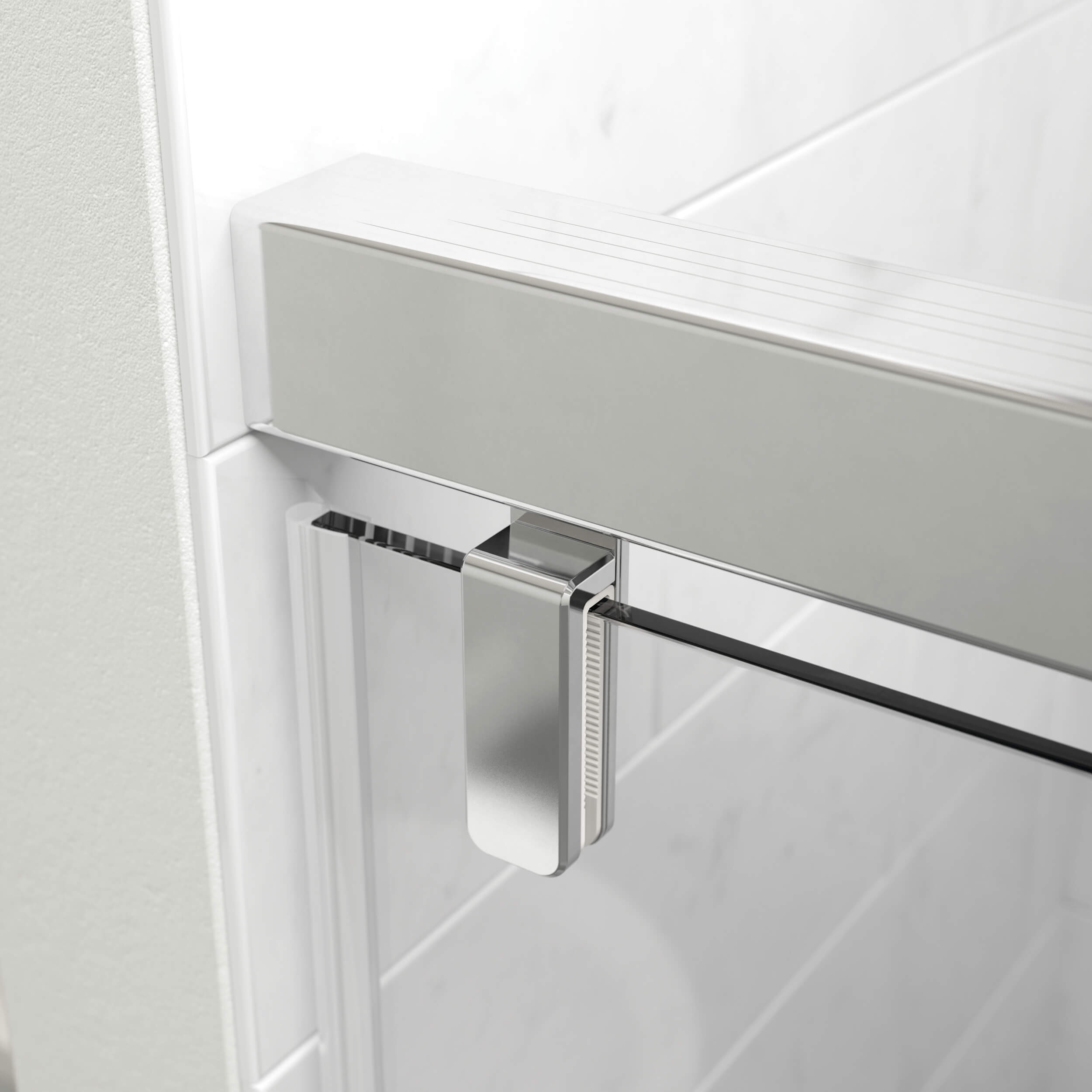 Metallic shower door handle on a glass shower enclosure