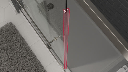 Glass shower enclosure highlighting the side seals in a bathroom setting